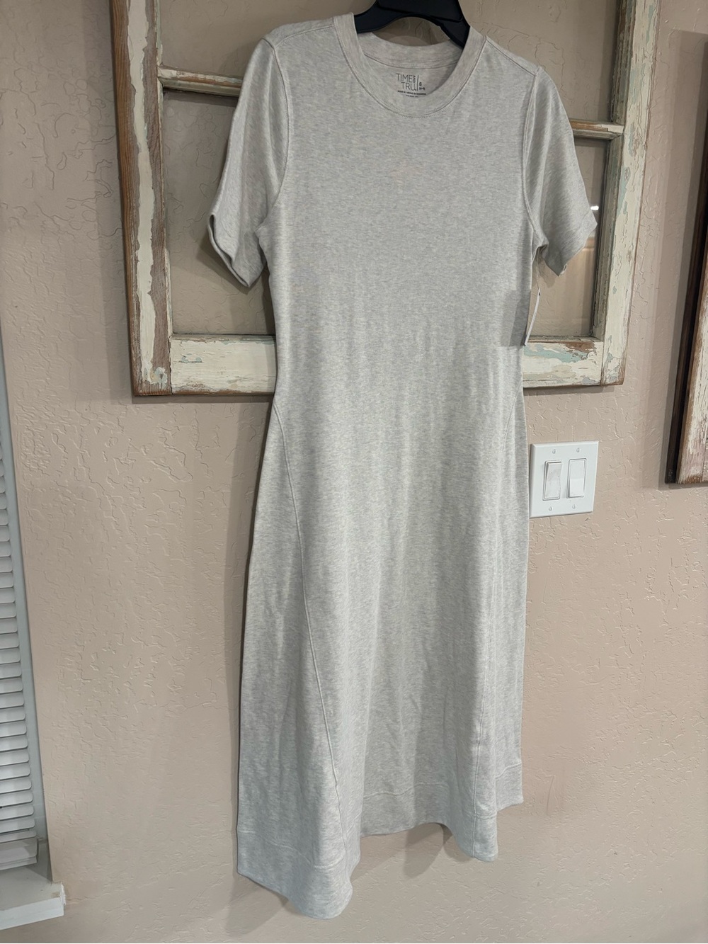 Light cream midi dress with flare bottom